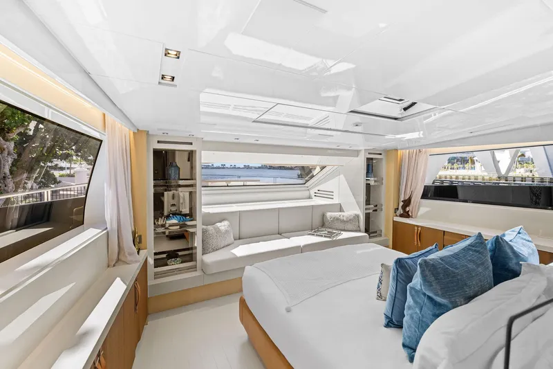 Notorious Yacht Photos Pics Luxurious interior of 2017 Sanlorenzo SL106 yacht with elegant furnishings and large windows.