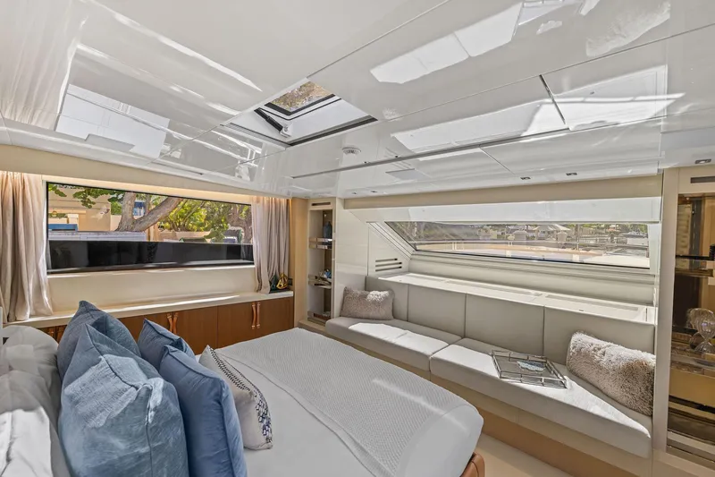 Notorious Yacht Photos Pics Luxurious interior of 2017 Sanlorenzo SL106 yacht with elegant seating and large windows.