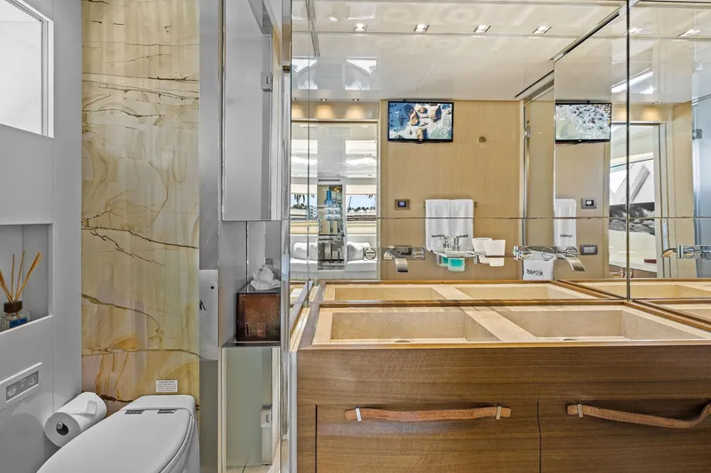 Notorious Yacht Photos Pics Luxurious bathroom in 2017 Sanlorenzo SL106 yacht with modern fixtures and elegant design.