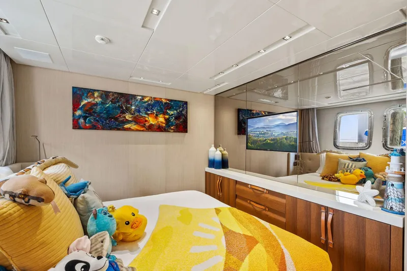 Notorious Yacht Photos Pics Luxurious 2017 Sanlorenzo SL106 yacht bedroom with vibrant decor and plush toys.