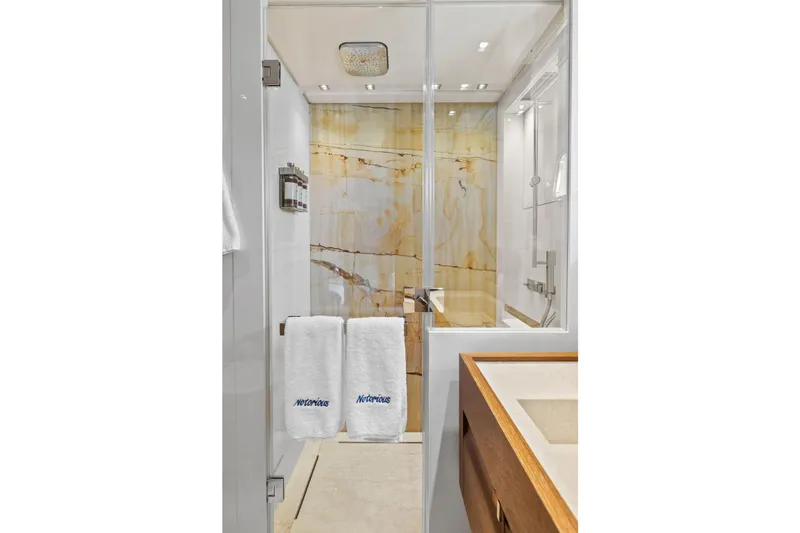 Notorious Yacht Photos Pics Luxurious bathroom in 2017 Sanlorenzo SL106 yacht with elegant marble shower.