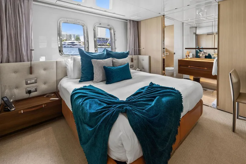 Notorious Yacht Photos Pics Luxurious bedroom interior on 2017 Sanlorenzo SL106 yacht with elegant decor and waterfront view.