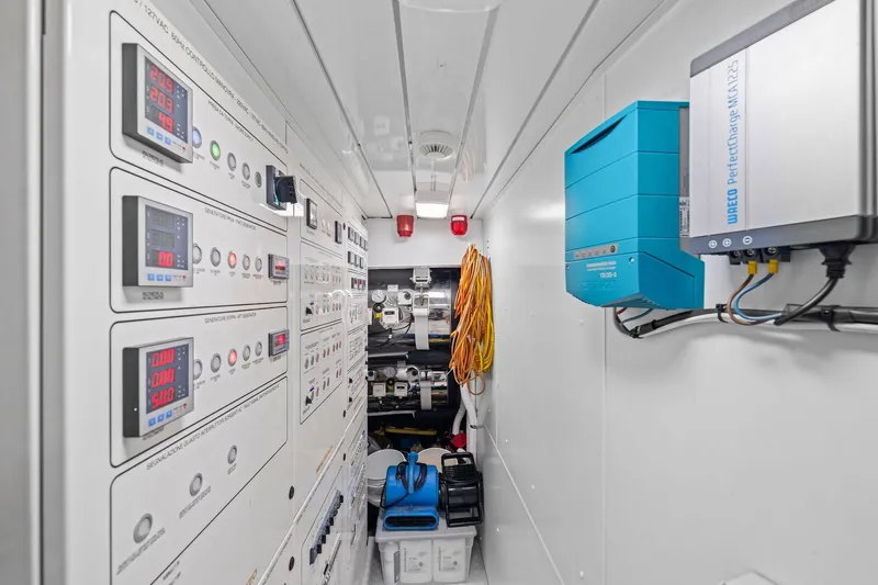 Notorious Yacht Photos Pics Electrical control room of 2017 Sanlorenzo SL106 yacht, featuring panels and equipment.