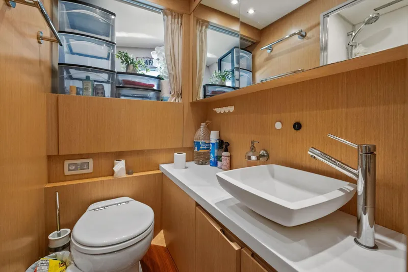 Notorious Yacht Photos Pics Luxurious bathroom on 2017 Sanlorenzo SL106 yacht with modern fixtures and ample storage.