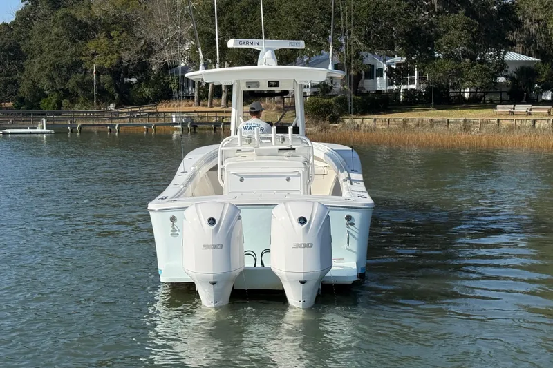  Yacht Photos Pics 2020 Regulator 31 boat with twin 300 engines on calm water.