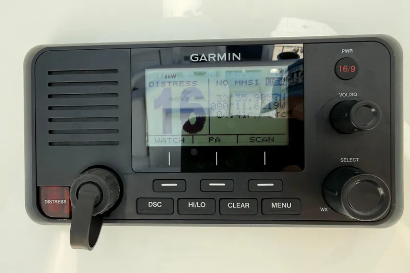  Yacht Photos Pics Garmin marine radio on a 2020 Regulator 31 boat, displaying distress channel.