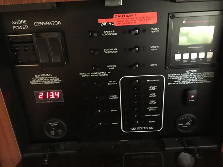  Yacht Photos Pics Control panel of a 2015 Pursuit SC 365i Sport Coupe with power and system switches.