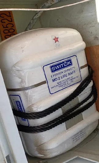 Alpha Carina Yacht Photos Pics Switlik 5-person life raft on 1993 Beneteau Oceanis 440 sailboat.