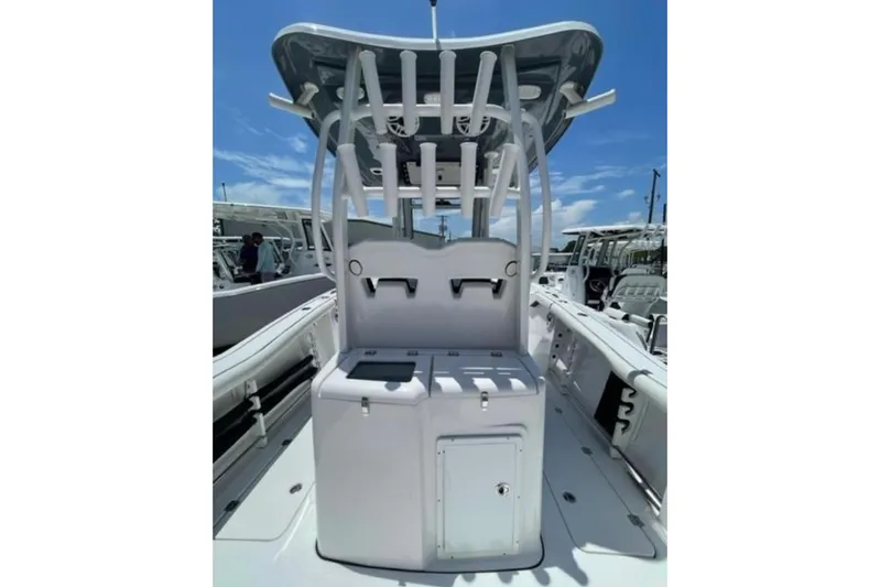  Yacht Photos Pics 2023 Tidewater 292 CC Adventure boat interior with rod holders and storage compartments.