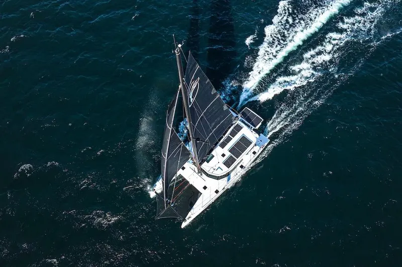  Yacht Photos Pics Aerial view of Balance 580 sailboat navigating ocean waters, 2027 model.