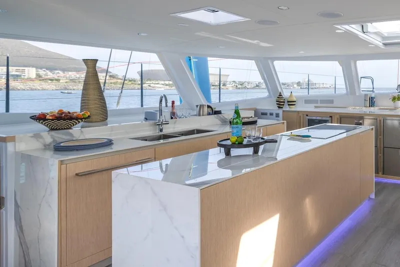  Yacht Photos Pics Luxurious kitchen interior on Balance 580 yacht, 2027 model, with modern design and ocean view.