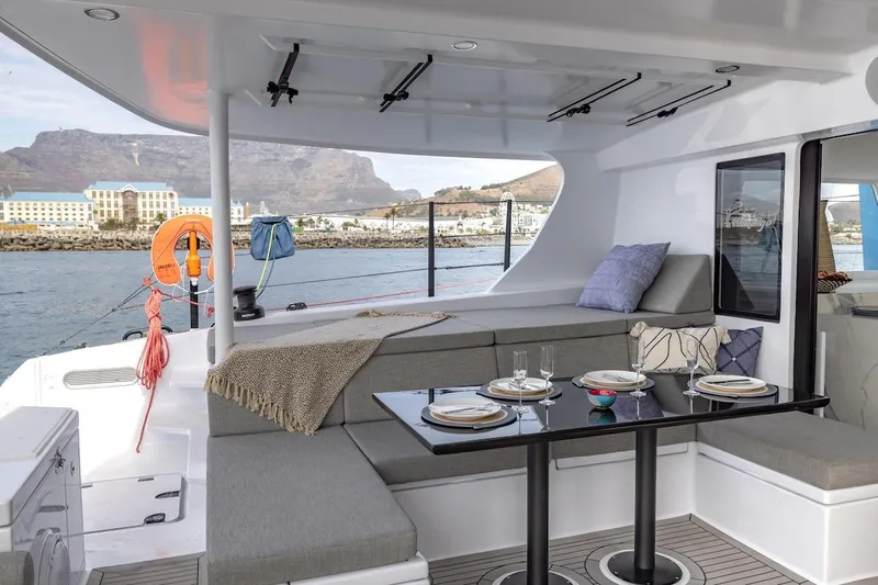  Yacht Photos Pics Luxurious Balance 580 yacht interior with dining area, scenic ocean view, and modern design, 2027 model.