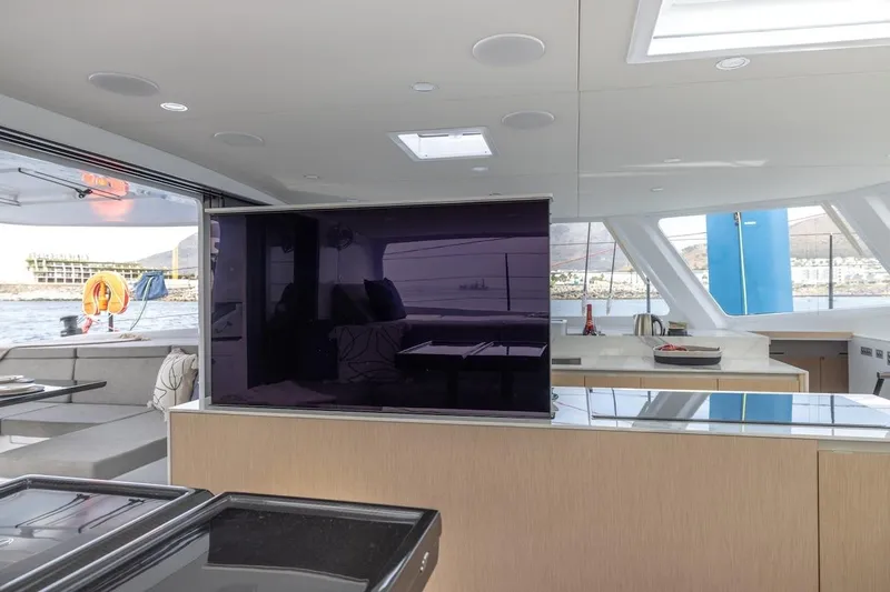  Yacht Photos Pics Luxurious interior of 2027 Balance 580 yacht with modern kitchen and sea view.