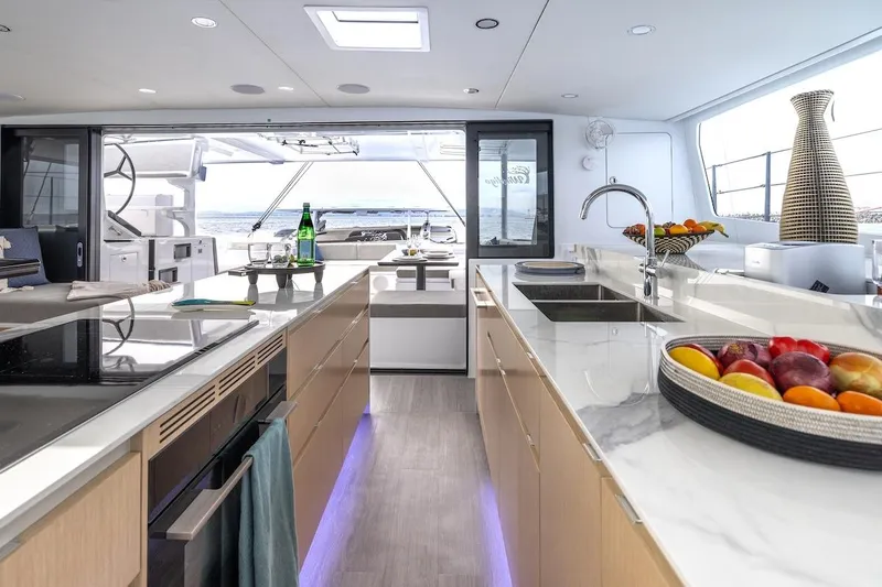  Yacht Photos Pics Luxurious kitchen interior on 2027 Balance 580 yacht with modern amenities and ocean view.