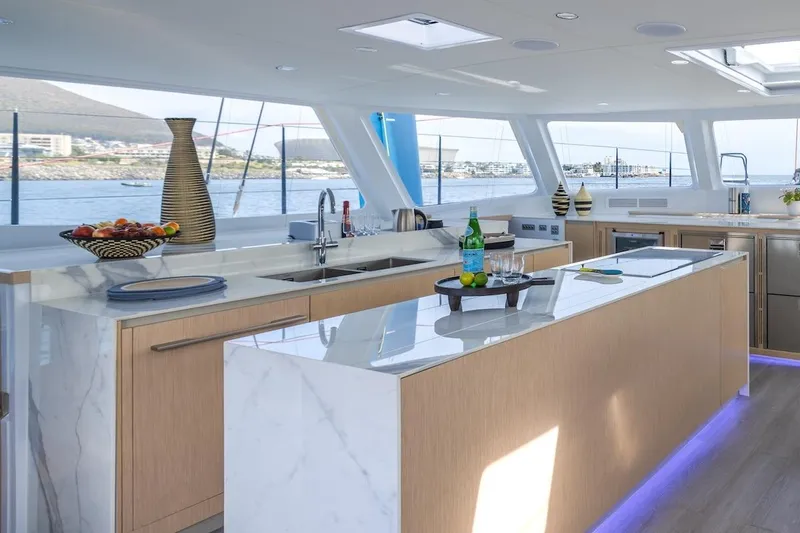  Yacht Photos Pics Luxurious yacht kitchen interior with marble countertops, Balance 580 model, 2027.