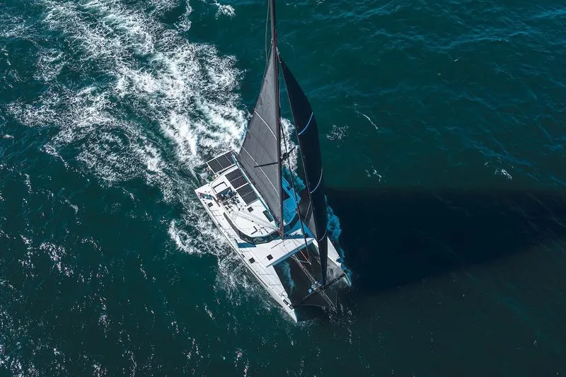  Yacht Photos Pics Aerial view of Balance 580 sailboat navigating ocean waters, 2027 model.