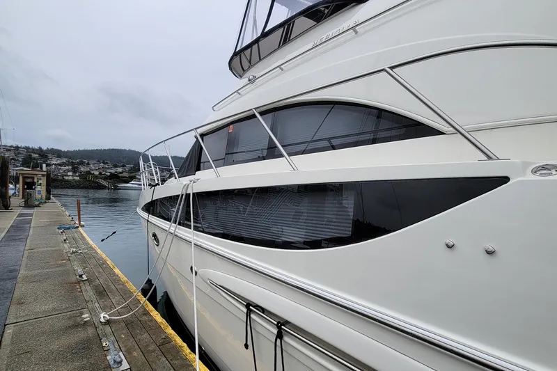  Yacht Photos Pics 2006 Meridian 408 Motoryacht docked on a cloudy day.