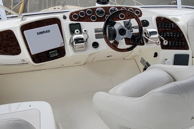  Yacht Photos Pics 2006 Meridian 408 Motoryacht helm with Simrad system.