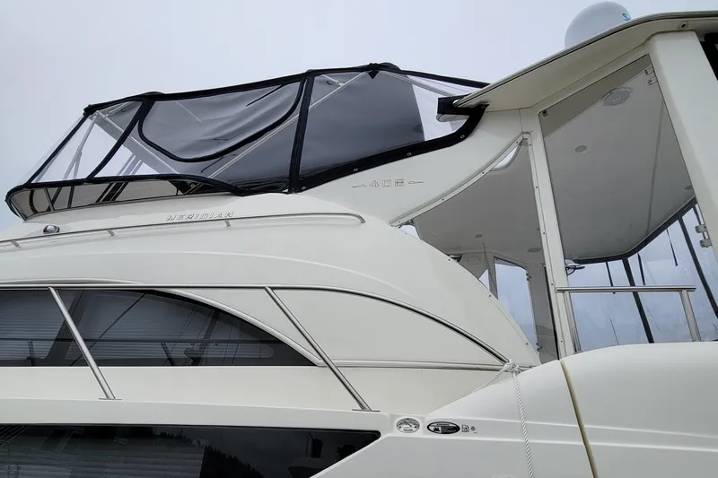  Yacht Photos Pics 2006 Meridian 408 Motoryacht with canopy and windows.