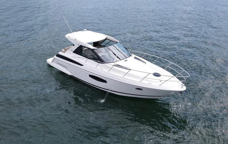 Lake Break Yacht Photos Pics 2016 Regal 42 Sport Coupe yacht cruising on open water.