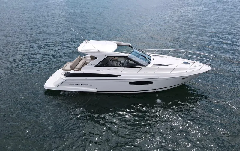 Lake Break Yacht Photos Pics 2016 Regal 42 Sport Coupe yacht cruising on open water.