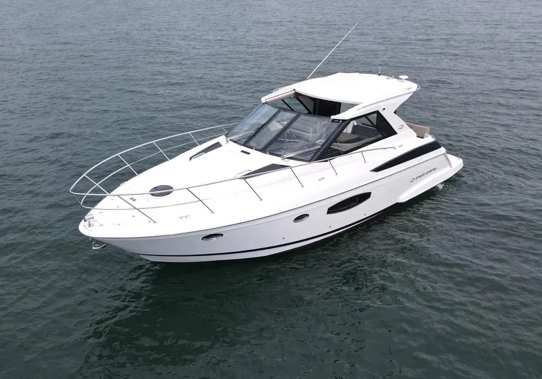 Lake Break Yacht Photos Pics 2016 Regal 42 Sport Coupe yacht on open water.