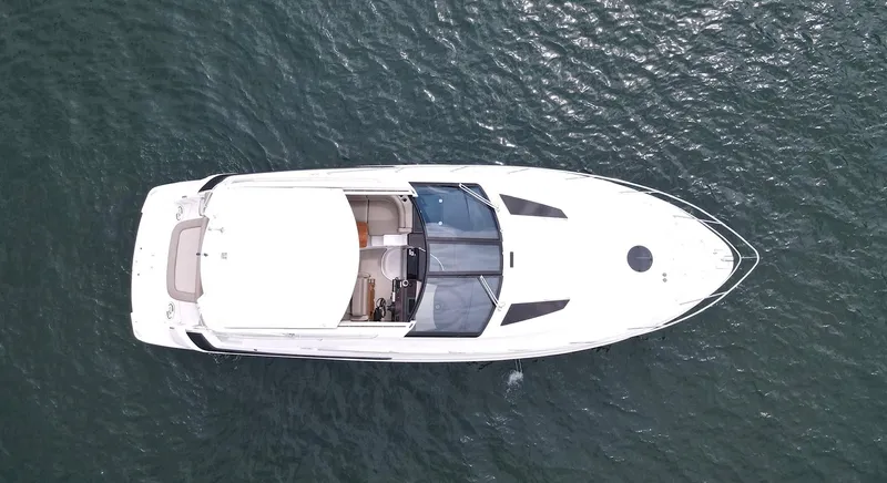 Lake Break Yacht Photos Pics Overhead view of 2016 Regal 42 Sport Coupe yacht on water.