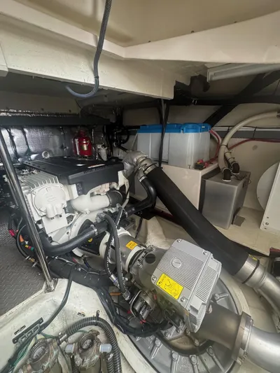 Lake Break Yacht Photos Pics Engine room of a 2016 Regal 42 Sport Coupe, showcasing mechanical components and systems.