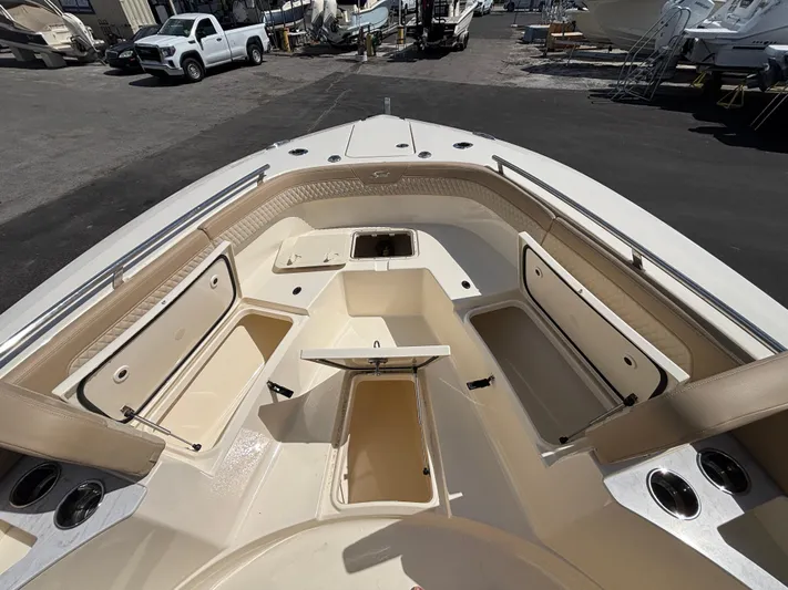  Yacht Photos Pics 2025 Scout 277 LXF boat interior with open storage compartments.