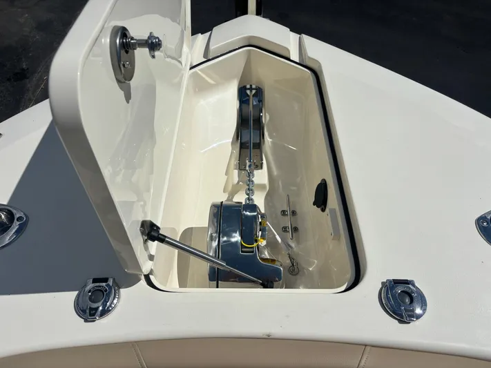  Yacht Photos Pics 2025 Scout 277 LXF anchor compartment with open hatch and visible chain mechanism.