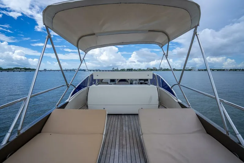 Gabriela Yacht Photos Pics Luxury Riva Sport 56 yacht deck with sun loungers, 2012 model, on calm waters.