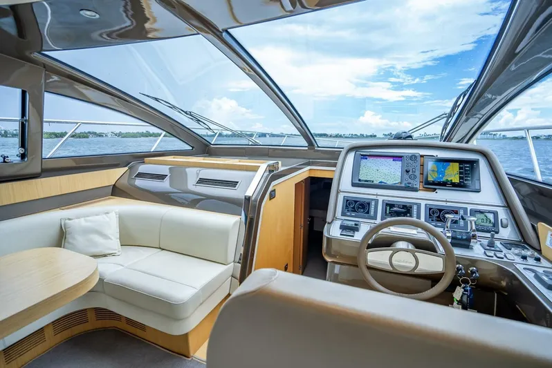 Gabriela Yacht Photos Pics Luxurious 2012 Riva Sport 56 yacht interior with modern navigation system and plush seating.