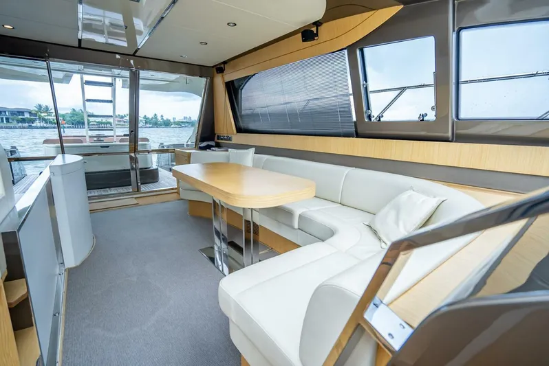 Gabriela Yacht Photos Pics Luxurious interior of 2012 Riva Sport 56 yacht with elegant seating and table.