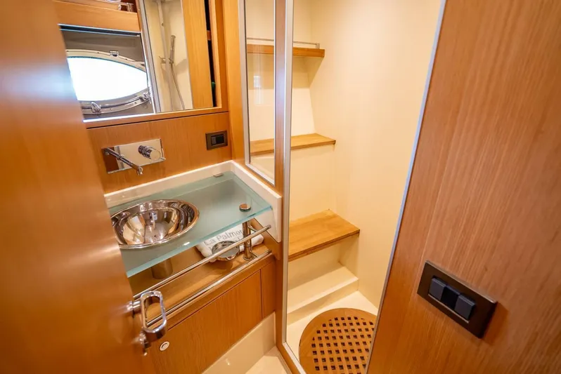 Gabriela Yacht Photos Pics Luxurious bathroom interior of 2012 Riva Sport 56 yacht with modern fixtures.