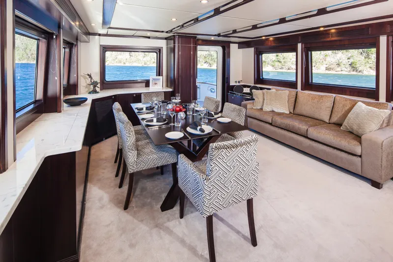  Yacht Photos Pics Luxurious interior of 2013 Nordhavn 68 yacht with elegant dining and seating area.