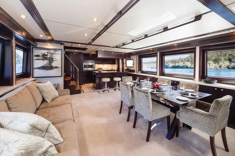  Yacht Photos Pics Luxurious interior of 2013 Nordhavn 68 yacht with elegant dining and living area.