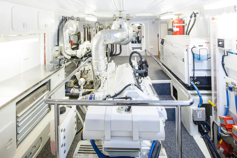  Yacht Photos Pics Engine room of a 2013 Nordhavn 68 yacht, featuring modern equipment and clean design.