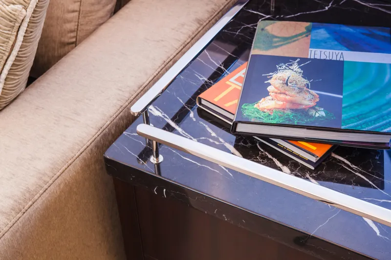  Yacht Photos Pics Luxurious Nordhavn 68 yacht interior with marble table and elegant books, 2013 model.