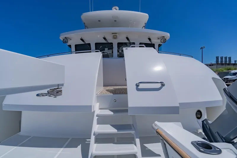  Yacht Photos Pics Nordhavn 68 yacht, 2013 model, featuring sleek white exterior and modern design.