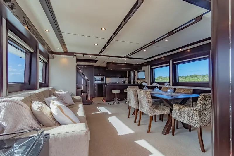  Yacht Photos Pics Luxurious interior of 2013 Nordhavn 68 yacht with elegant dining and living area.