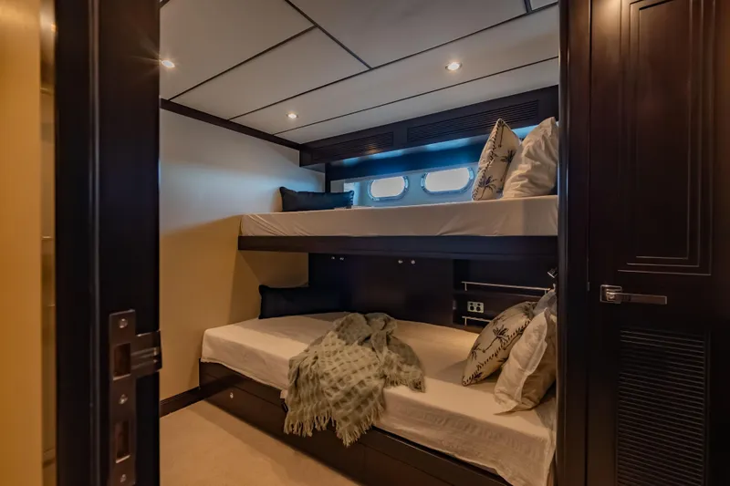  Yacht Photos Pics Luxurious 2013 Nordhavn 68 yacht cabin with cozy bunk beds and elegant decor.