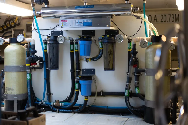  Yacht Photos Pics Engine room of a 2013 Nordhavn 68 yacht with filtration system and gauges.