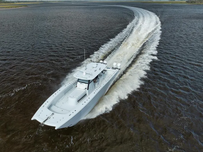  Yacht Photos Pics Freeman 47 boat cruising on open water, 2023 model, aerial view.