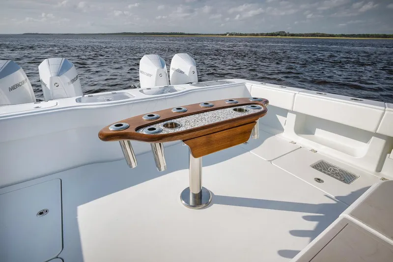  Yacht Photos Pics Freeman 47 boat deck with rod holders, 2023 model, on open water.