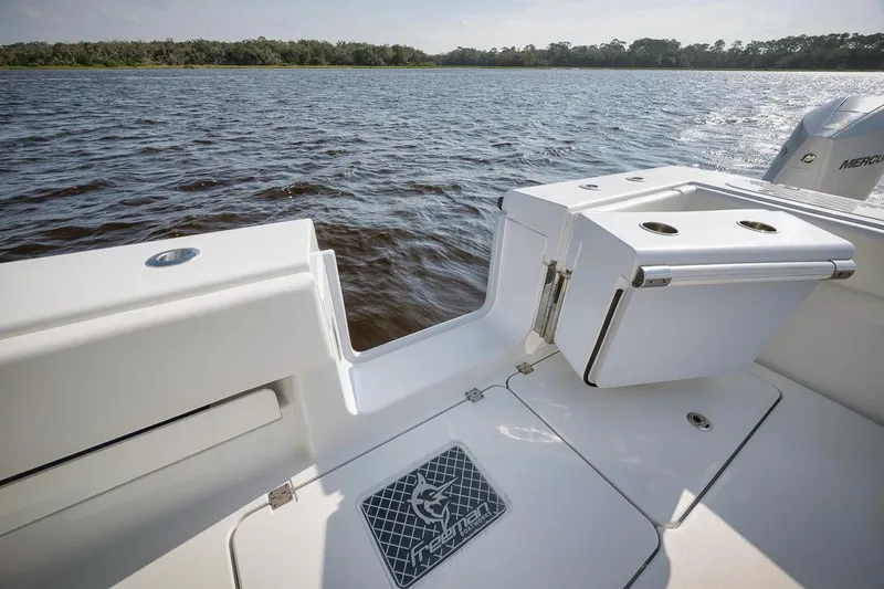  Yacht Photos Pics Freeman 47 boat deck, 2023 model, overlooking calm waters and distant shoreline.