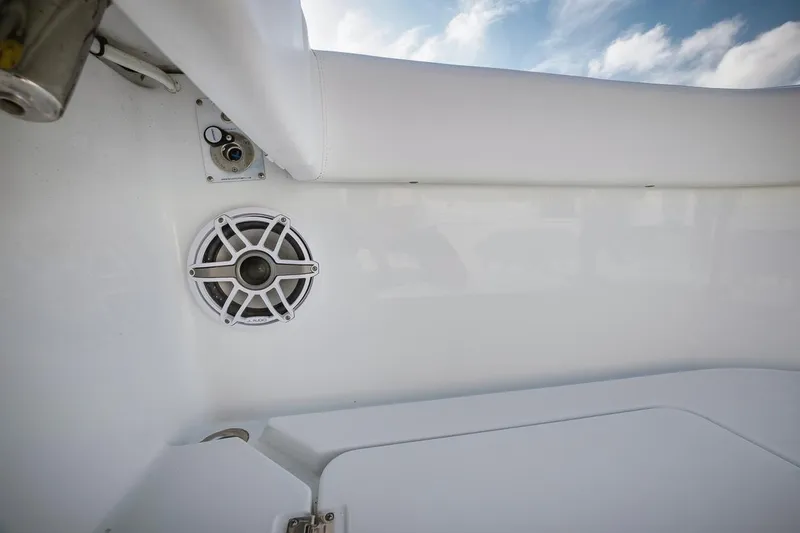  Yacht Photos Pics Freeman 47 boat interior, 2023 model, featuring a built-in speaker and white seating.