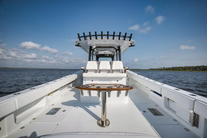  Yacht Photos Pics Freeman 47 boat, 2023 model, on open water under blue sky.