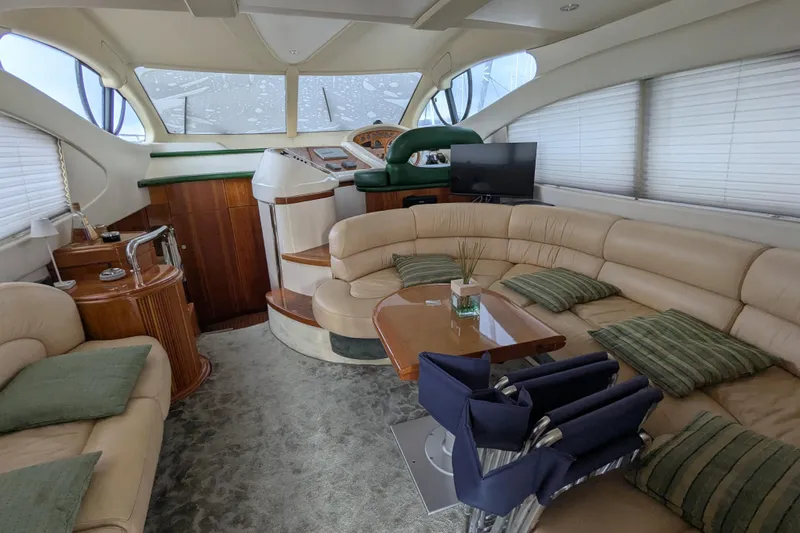  Yacht Photos Pics Luxurious interior of a 2000 Azimut 46 yacht with plush seating and elegant decor.