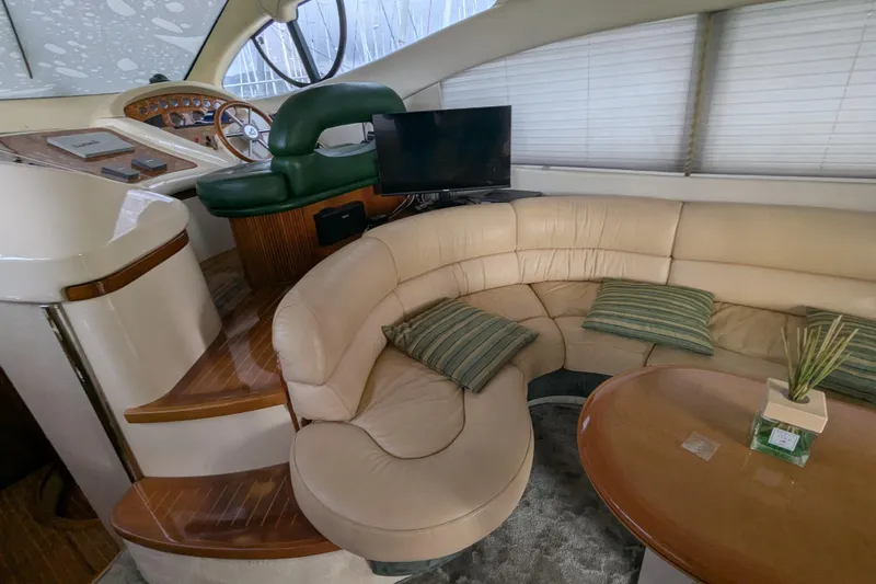  Yacht Photos Pics Luxurious interior of a 2000 Azimut 46 yacht with leather seating and modern helm.