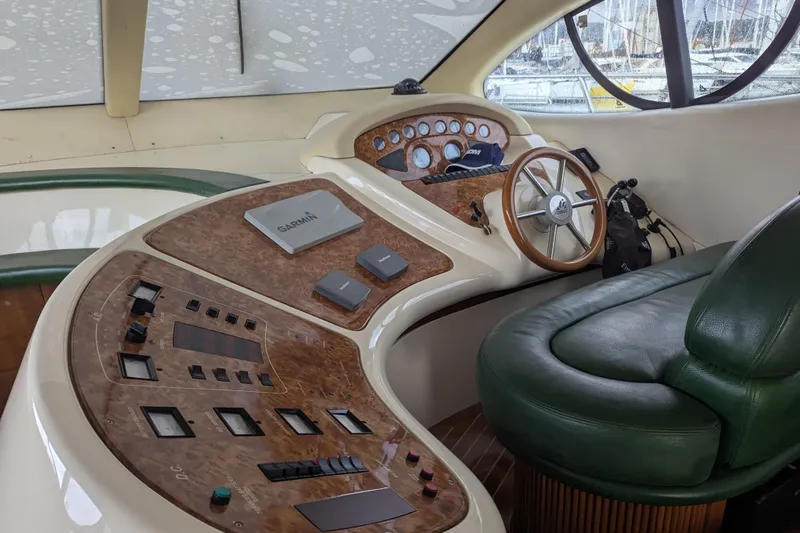  Yacht Photos Pics Cockpit of 2000 Azimut 46 yacht with steering wheel and control panels.